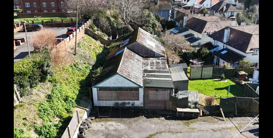 FORMER GARAGE ON LARGE PLOT WITH POTENTIAL