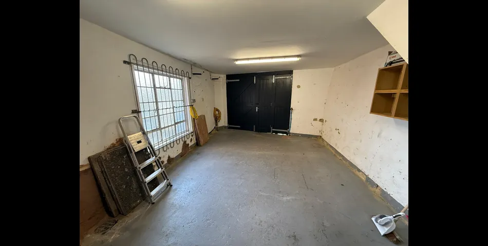 FORMER GARAGE AND STORAGE BUILDING FOR DEVELOPMENT