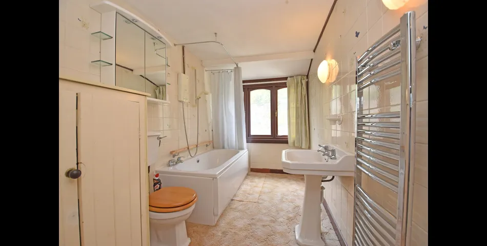 MID TERRACE PROPERTY WITH THREE DWELLINGS FOR MODERNISATION