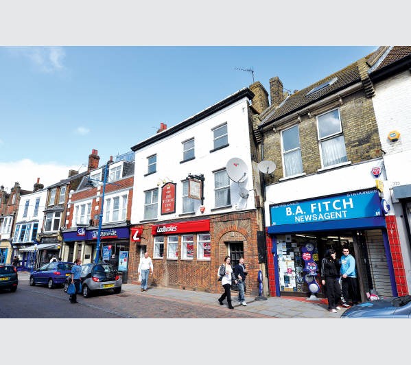 Freehold Town Centre Betting Shop Investment with Vacant Upper Floors