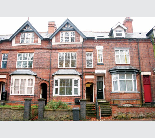 A Freehold Mid Terrace Building 	Internally arranged to provide Three Self-Contained Flats 	Comprisi