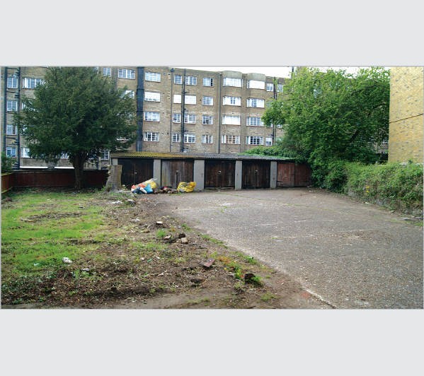A Freehold Site extending to Approximately 0.034 Hectares (0.084 Acres). Part Occupied by 5 Garages.