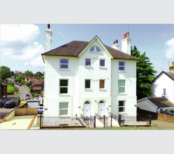 Two Freehold Adjoining Semi-Detached Buildings