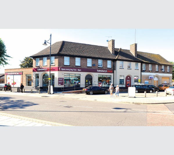 Well Located Freehold Shopping Parade & Residential Investment