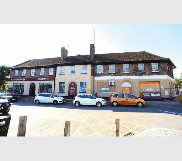 Well Located Freehold Shopping Parade & Residential Investment