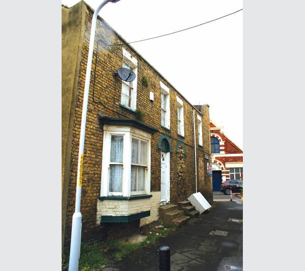 A Freehold Corner Building arranged to provide a Ground Floor Retail Unit together with a Self-Conta