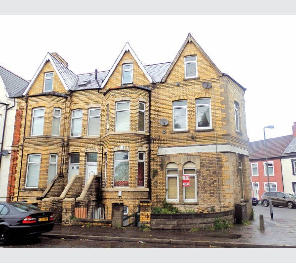 A Freehold Ground Rent Investment secured upon a Mid Terrace Building arranged to provide Four Self-