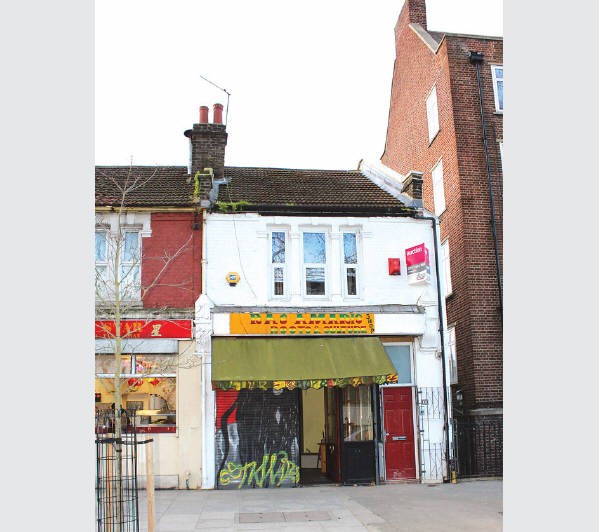 A Freehold End of Terrace Building arranged to provide a Retail Unit and Two Self-Contained Flats. R