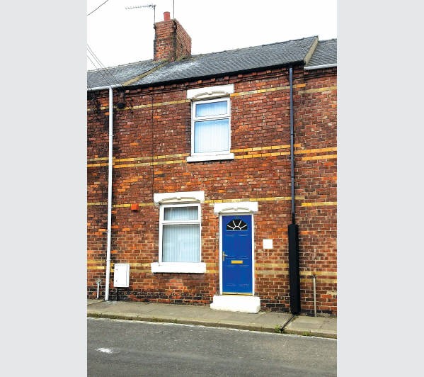 A Freehold Mid Terrace House subject to an Assured Shorthold Tenancy
