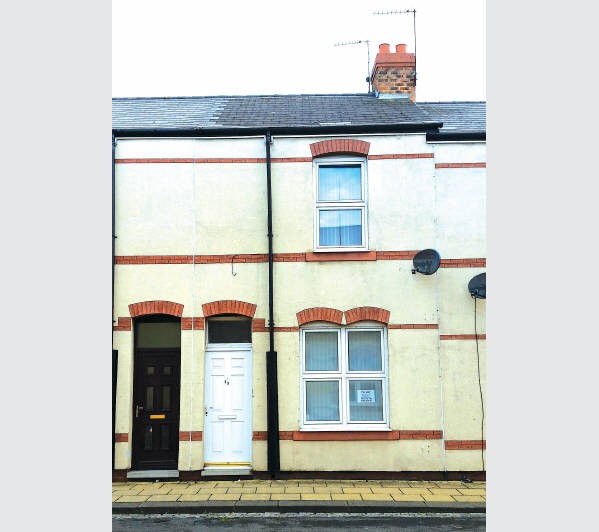 A Freehold Mid Terrace House subject to an Assured Shorthold Tenancy