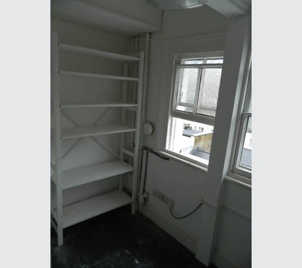 A Freehold Part Reversionary Ground Rent Investment secured upon a Mid Terrace Building arranged to 