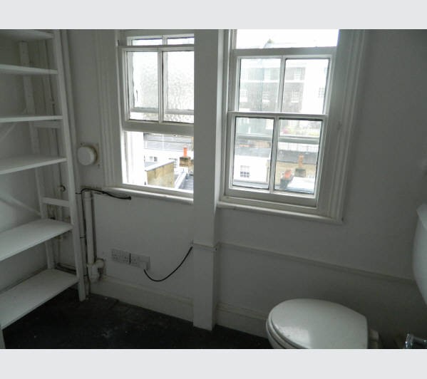 A Freehold Part Reversionary Ground Rent Investment secured upon a Mid Terrace Building arranged to 