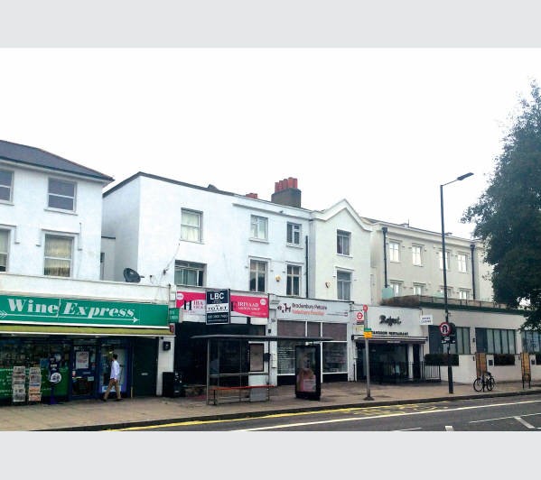 A Freehold Four Storey Mid Terrace Building