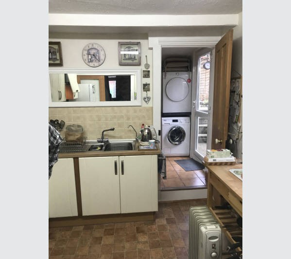 A Freehold Mid Terrace House