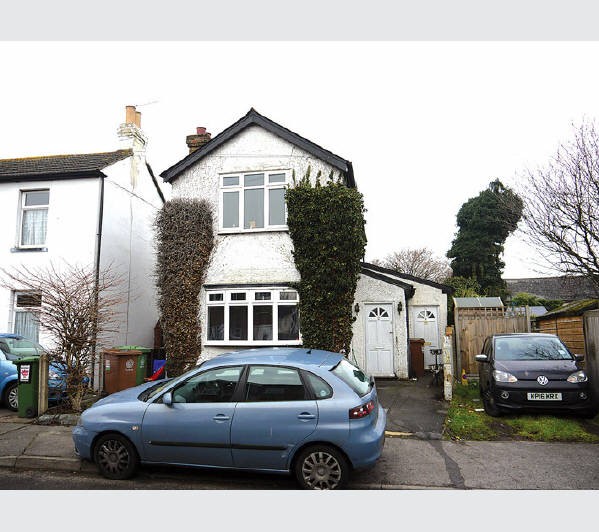 A Freehold Detached House with Off-Street Parking and a Garden