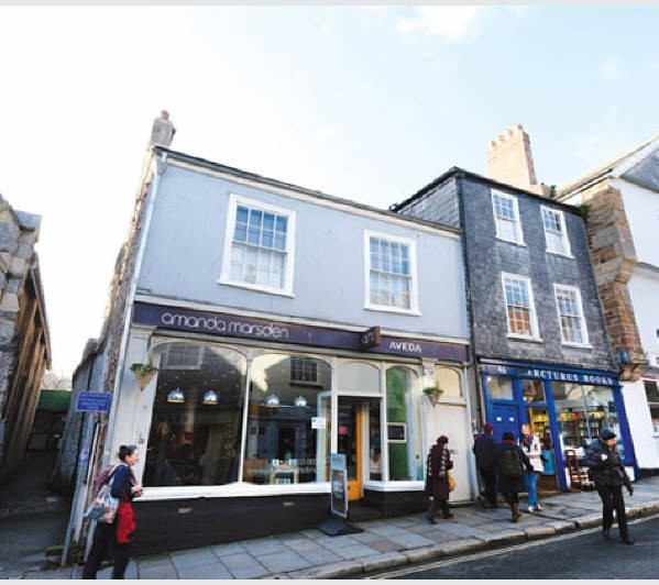 •	Freehold Grade II Listed Shop and Ground Rent Investment