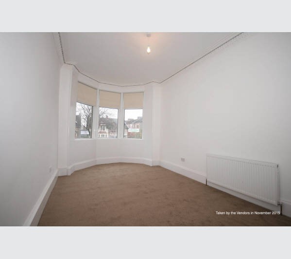 A Scottish Heritable Self-Contained Purpose Built Ground Floor Tenement Flat subject to a Short Assu