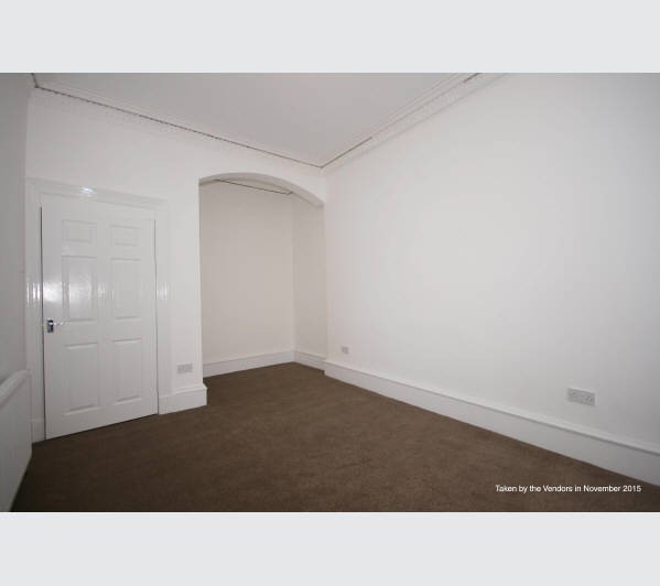A Scottish Heritable Self-Contained Purpose Built Ground Floor Tenement Flat subject to a Short Assu