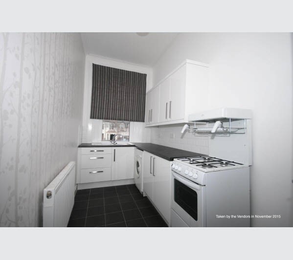 A Scottish Heritable Self-Contained Purpose Built Ground Floor Tenement Flat subject to a Short Assu