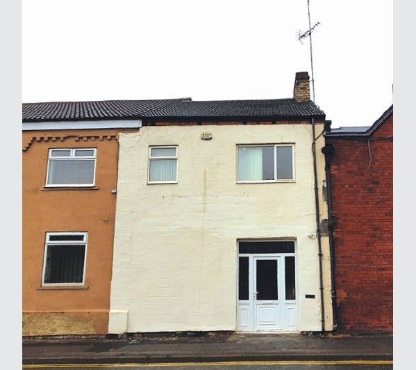 A Freehold Mid Terrace Building internally arranged to provide 2 x Two Bedroom Self-Contained Flats.
