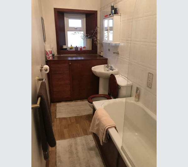 A Freehold Mid Terrace Building internally arranged to provide Seven Self-Contained Flats. Each Flat