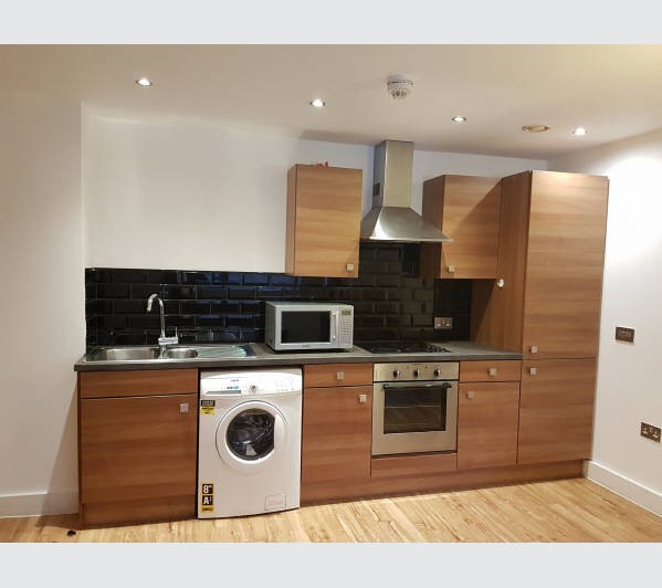 A Long Leasehold Self-Contained Purpose Built First Floor Two Bedroom Flat subject to an Assured Sho
