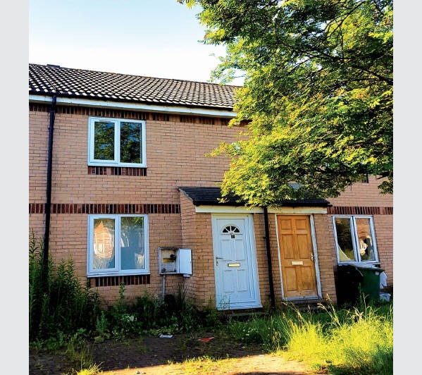 A Freehold Mid Terrace House with Front and Rear Gardens and Off-Street Parking