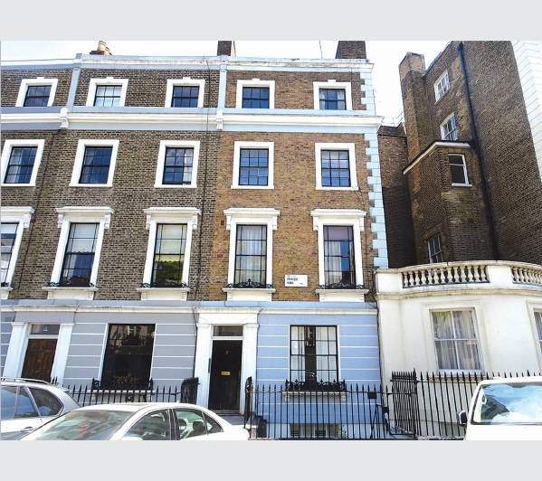 A Freehold Ground Rent Investment secured upon a Mid Terrace Building internally arranged to provide