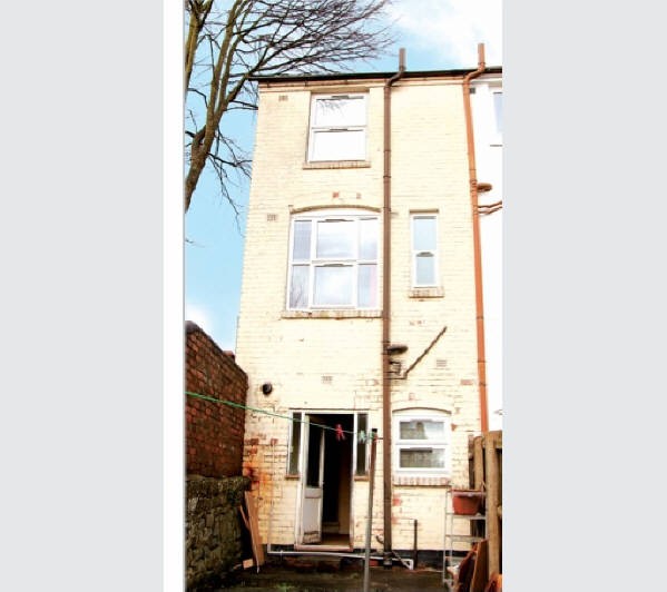 A Freehold End of Terrace House with Rear Garden
