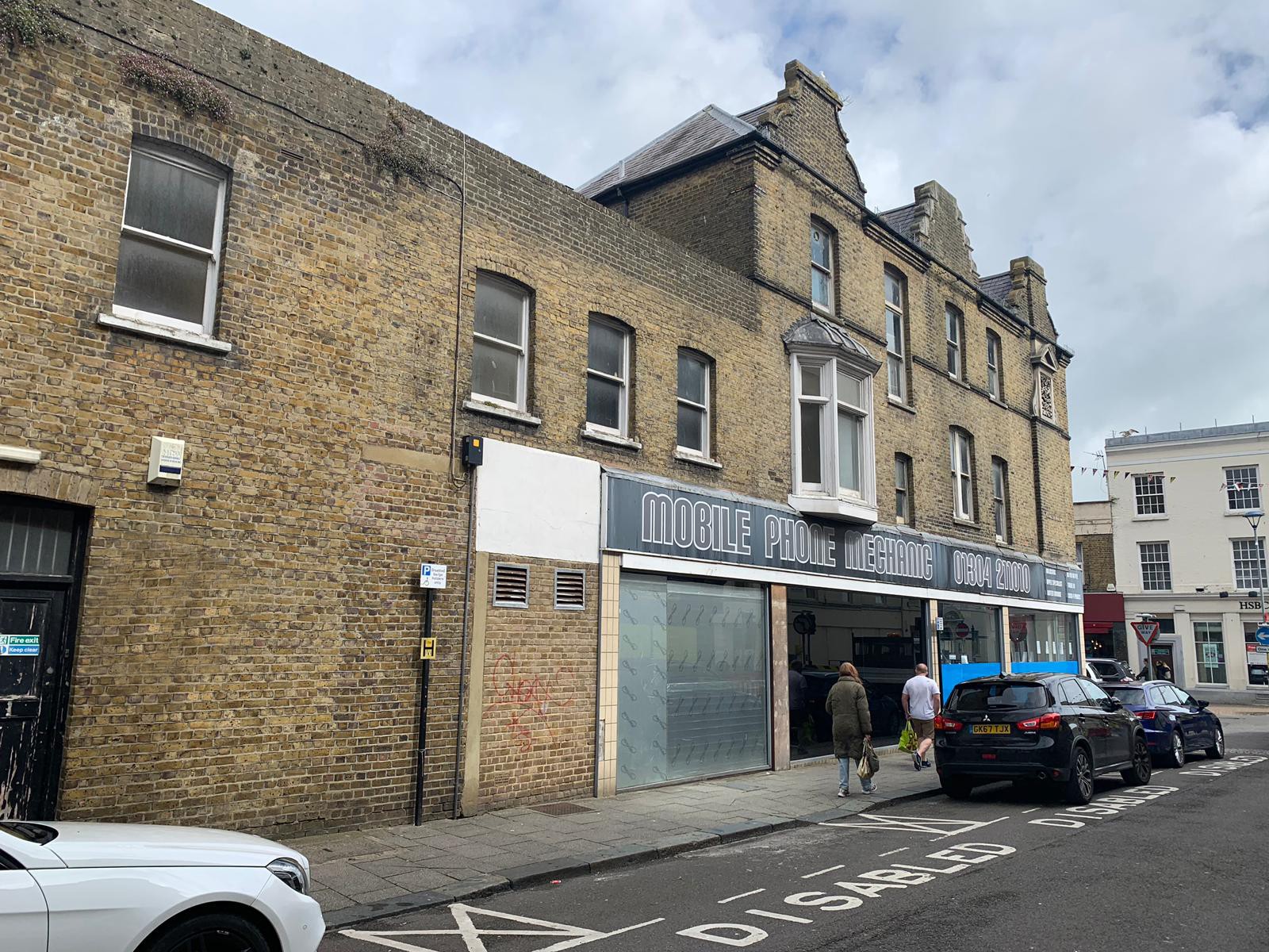VACANT - A Freehold Substantial Mixed Use Corner Building 