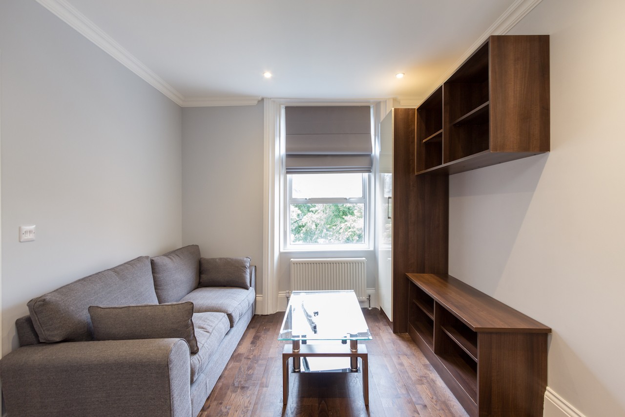 INVESTMENT - Long Leasehold Well Located Second Floor Flat 