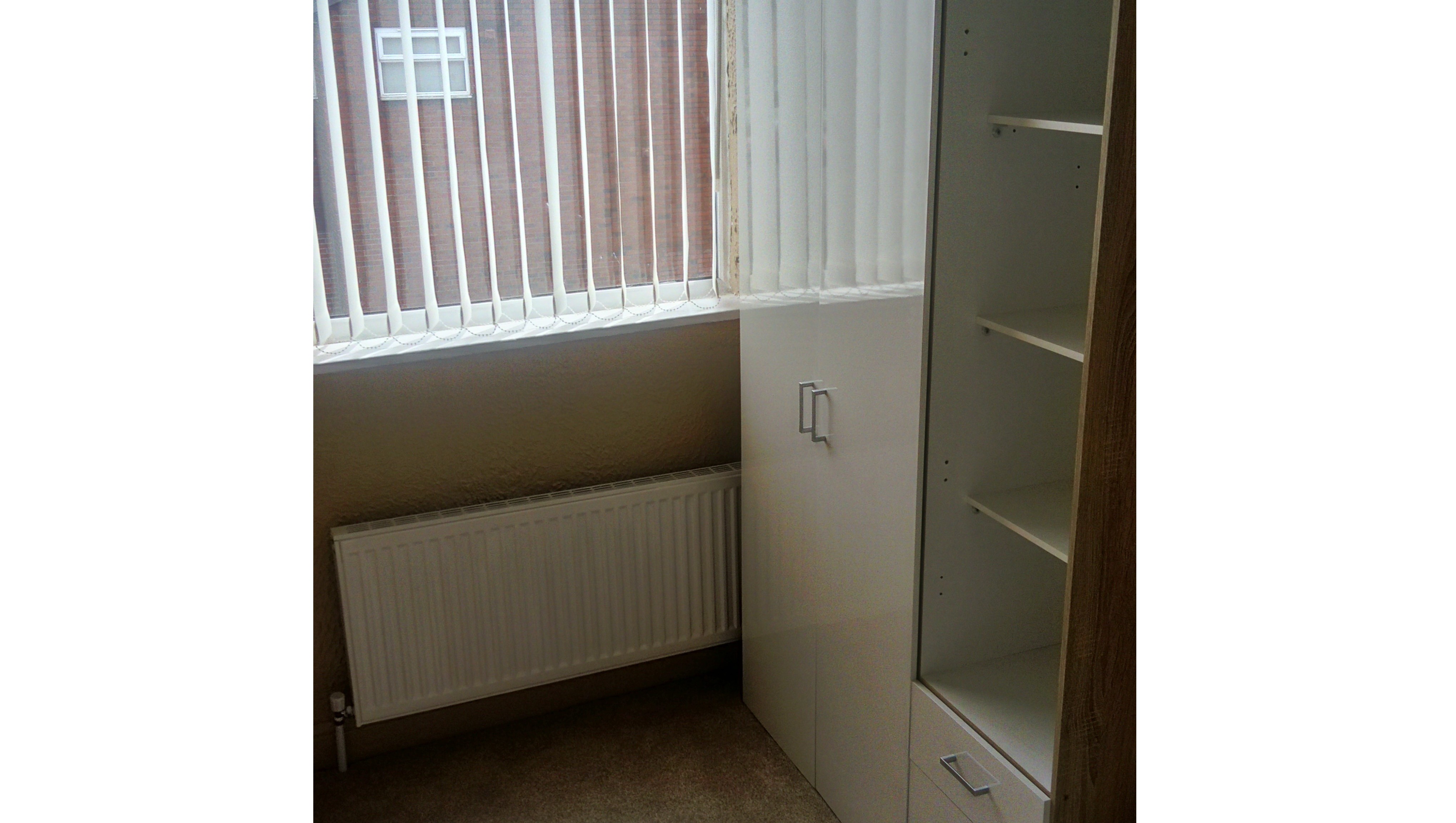 INVESTMENT - Freehold Corner Building arranged as a Shop and Three Self Contained Flats