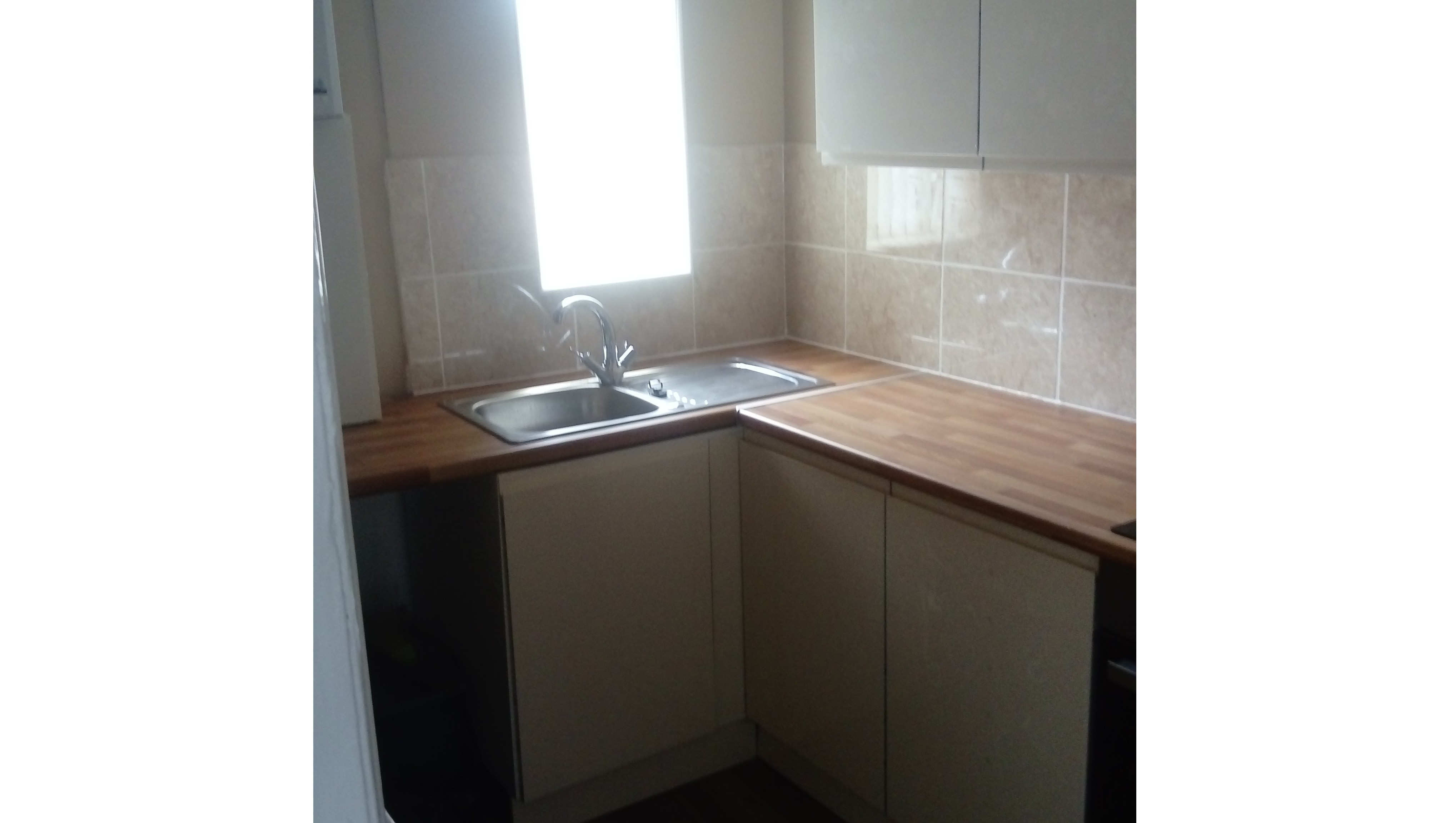INVESTMENT - Freehold Corner Building arranged as a Shop and Three Self Contained Flats