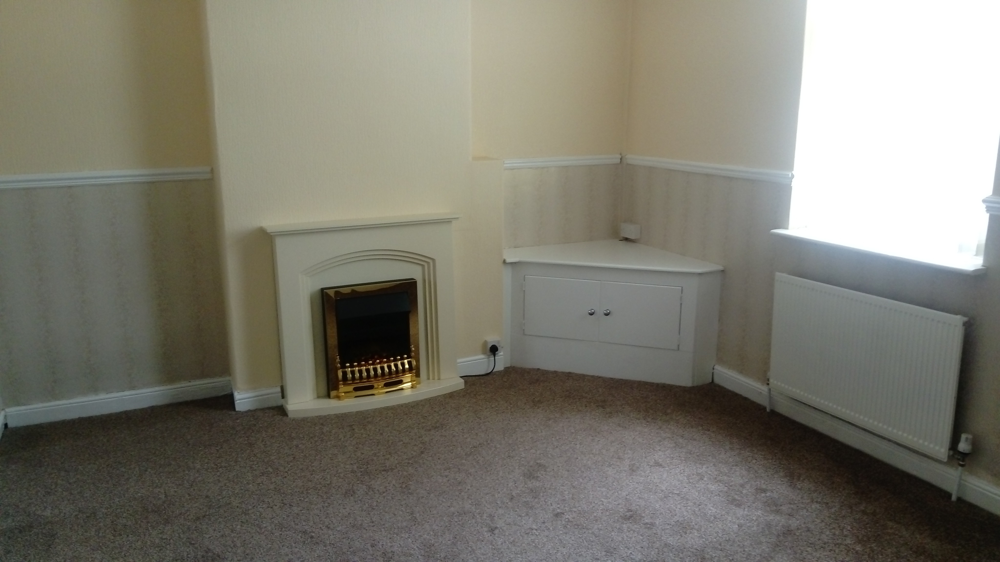 INVESTMENT - Freehold Corner Building arranged as a Shop and Three Self Contained Flats