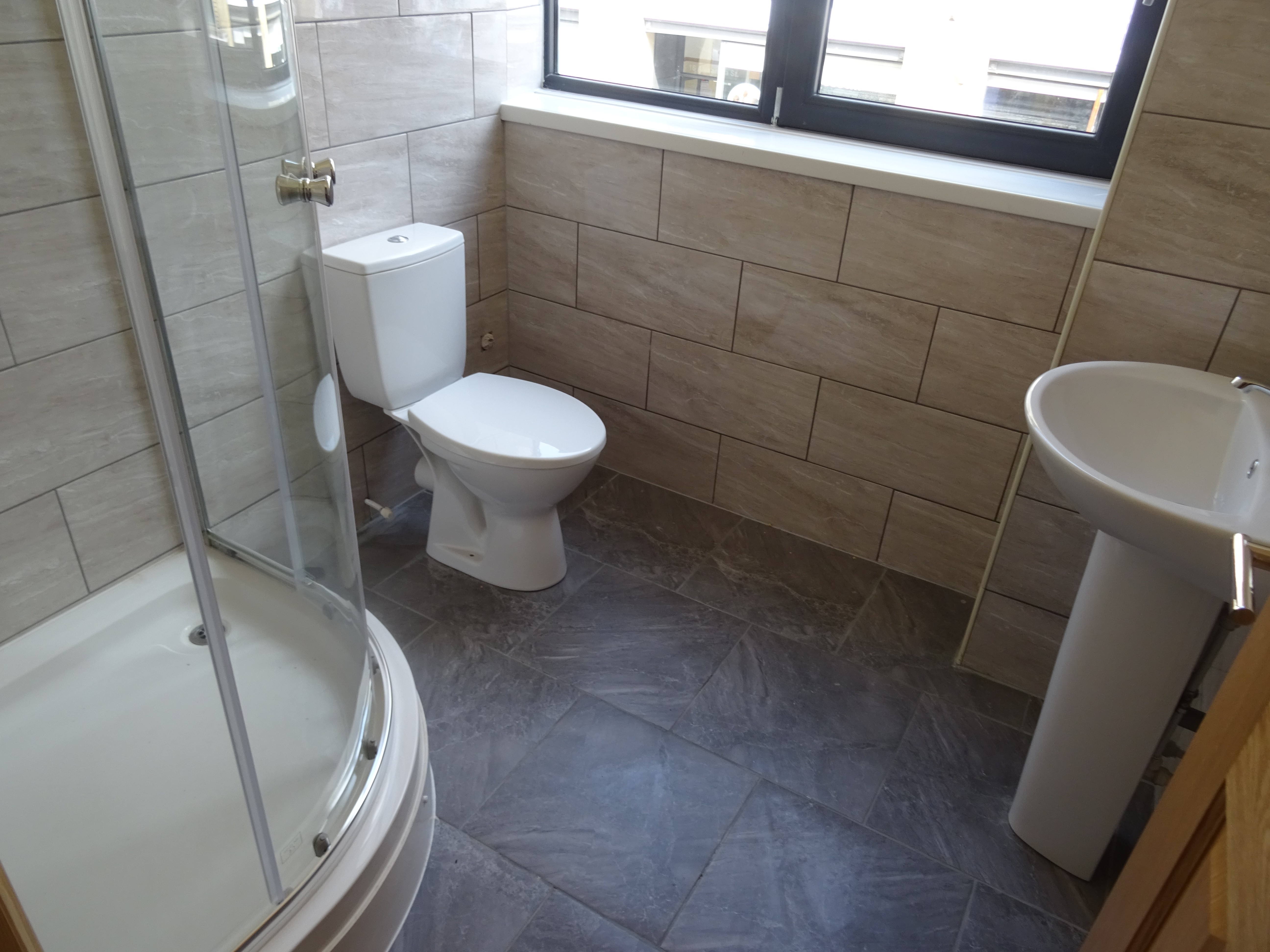 INVESTMENT - Unbroken Head Leasehold Upper Parts comprising 51 Self Contained Flats