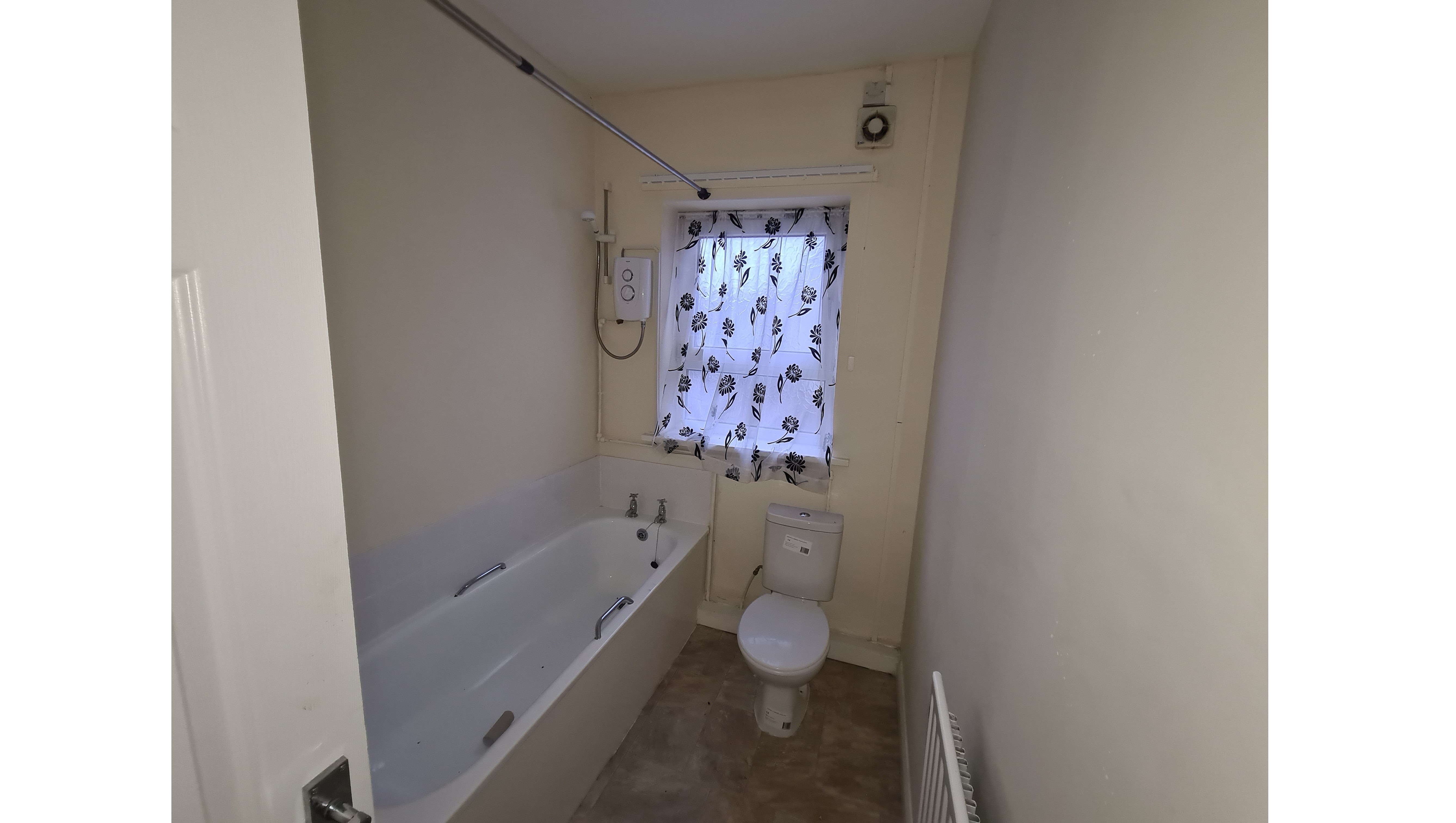VACANT - Freehold Mid Terrace House 