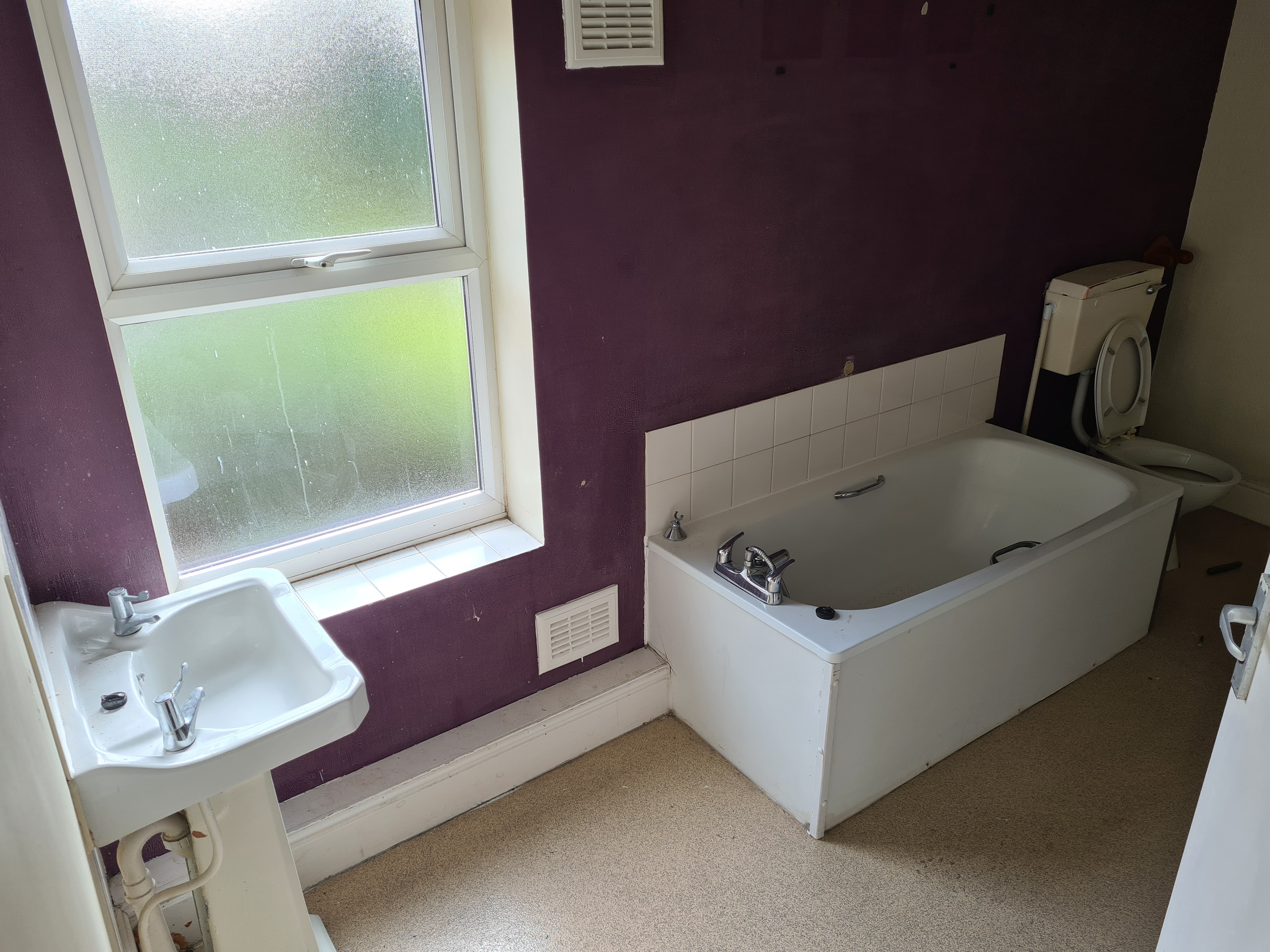 VACANT - Freehold Mid Terrace House