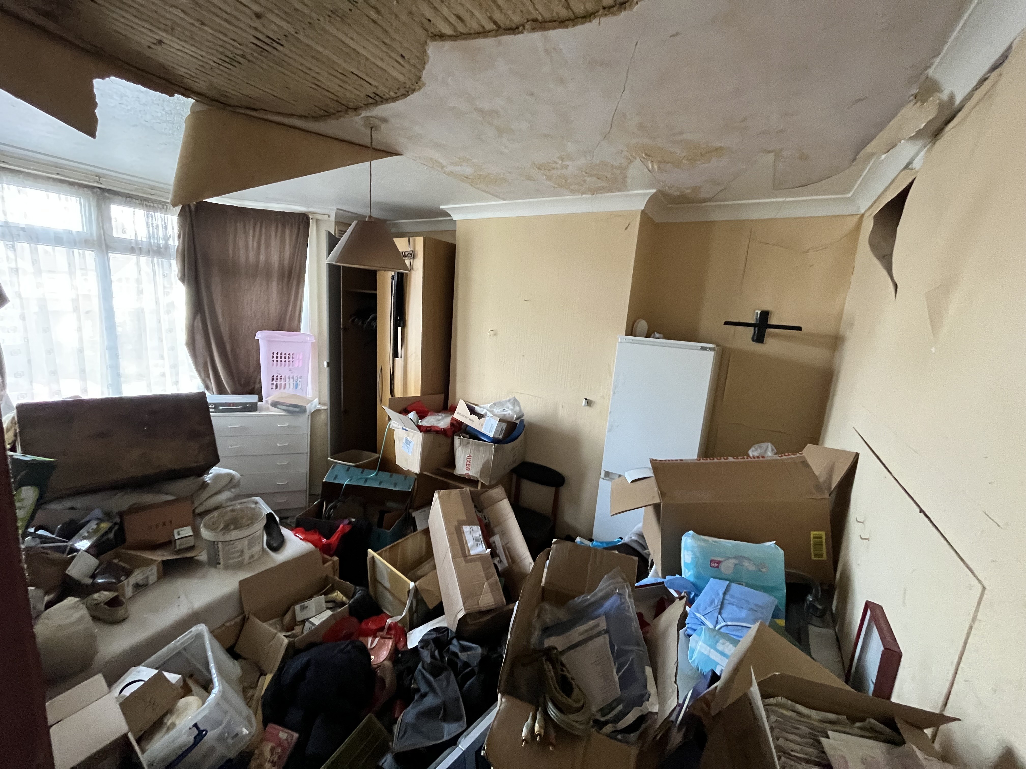 VACANT - Freehold Fire Damaged Mid Terrace House