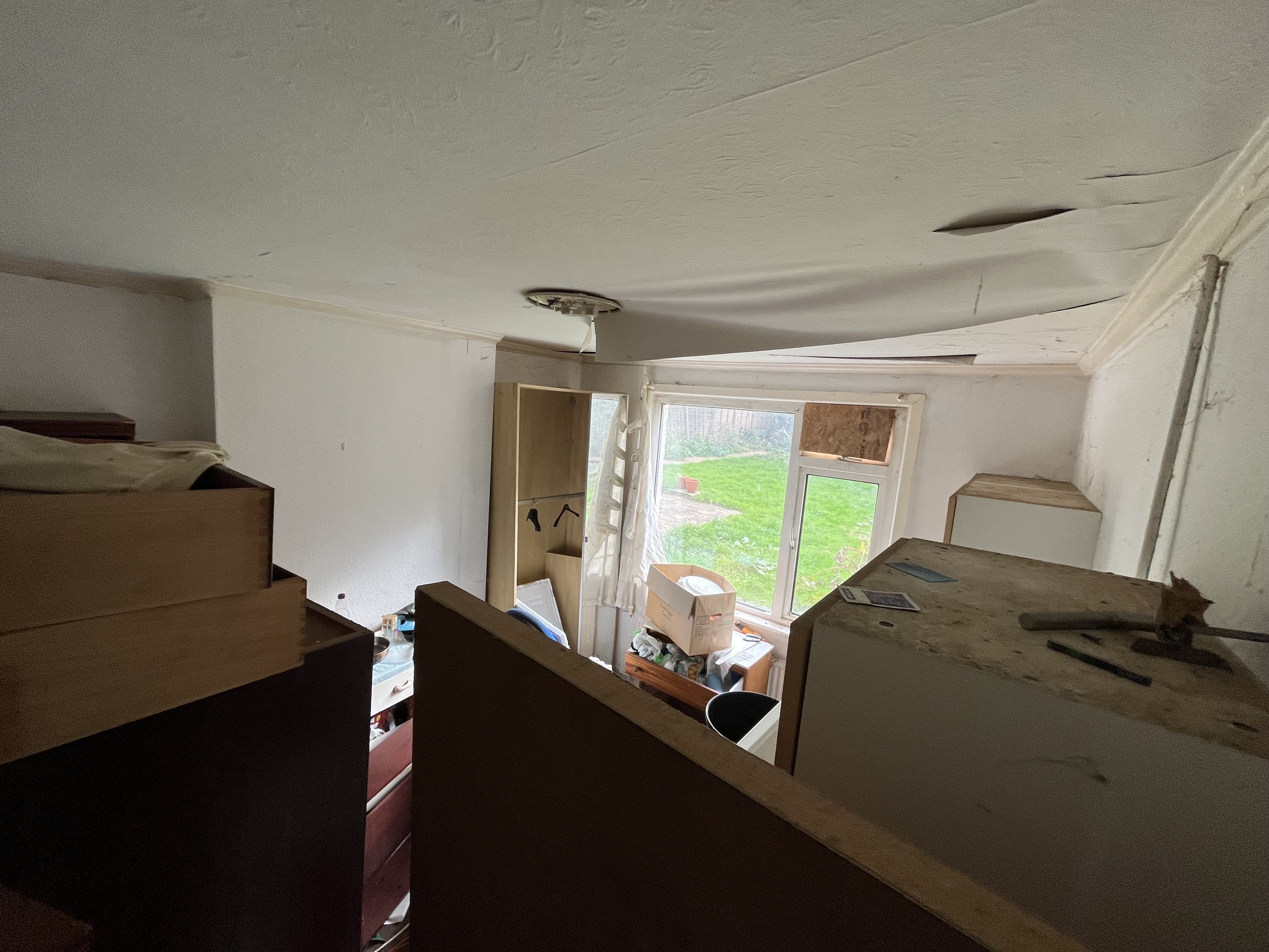VACANT - Freehold Fire Damaged Mid Terrace House
