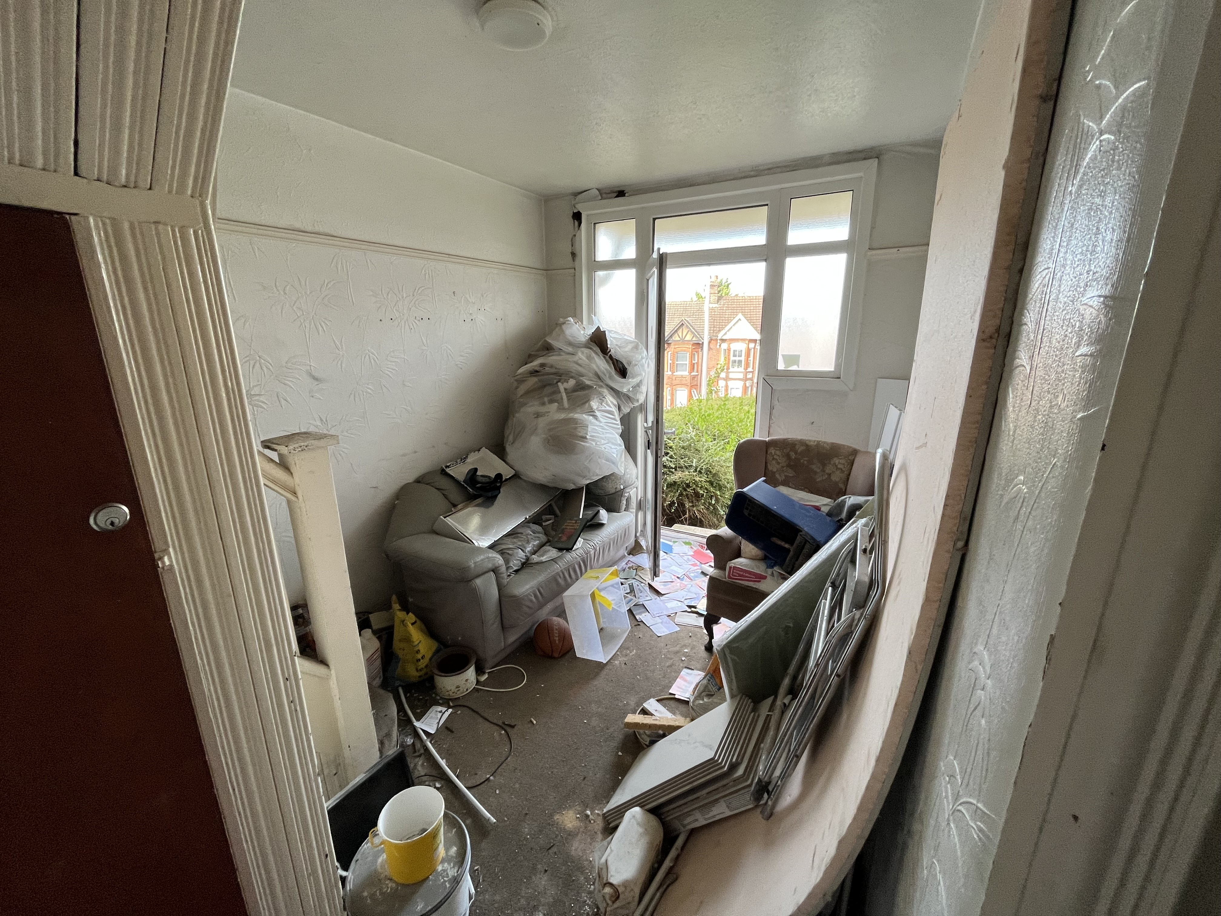 VACANT - Freehold Fire Damaged Mid Terrace House