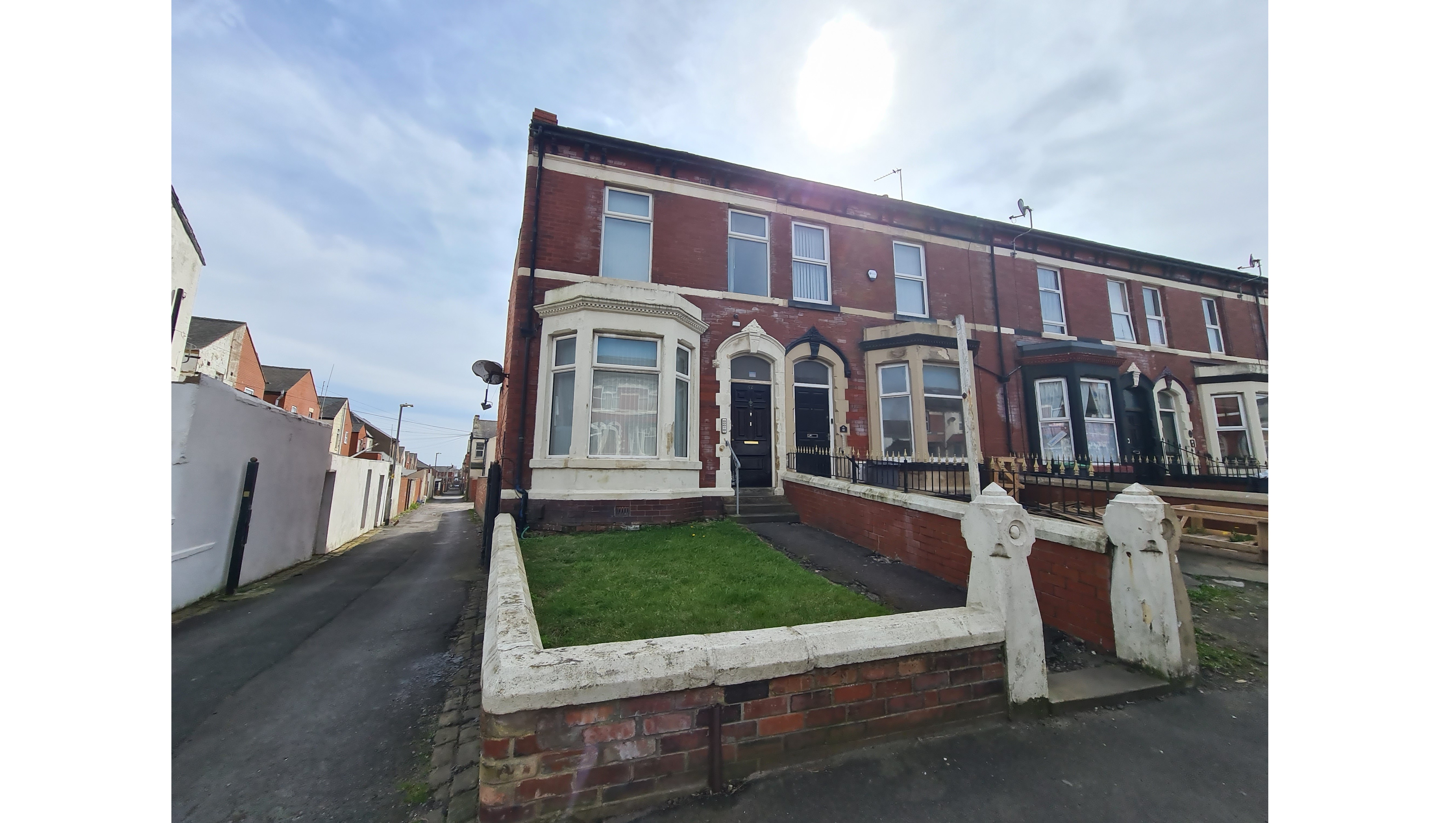 INVESTMENT - Freehold End of Terrace Building arranged to provide Three self contained Flats