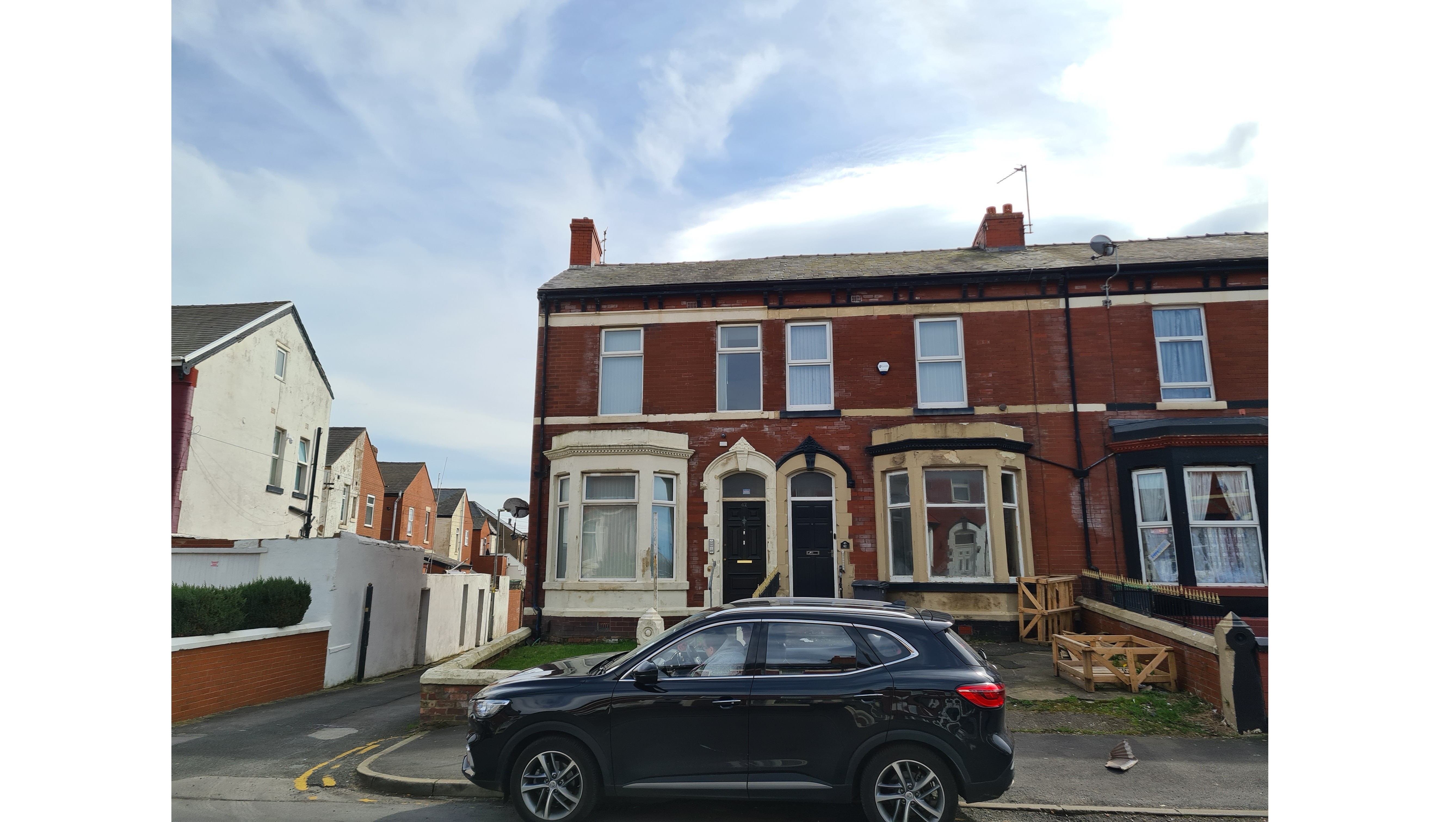INVESTMENT - Freehold End of Terrace Building arranged to provide Three self contained Flats
