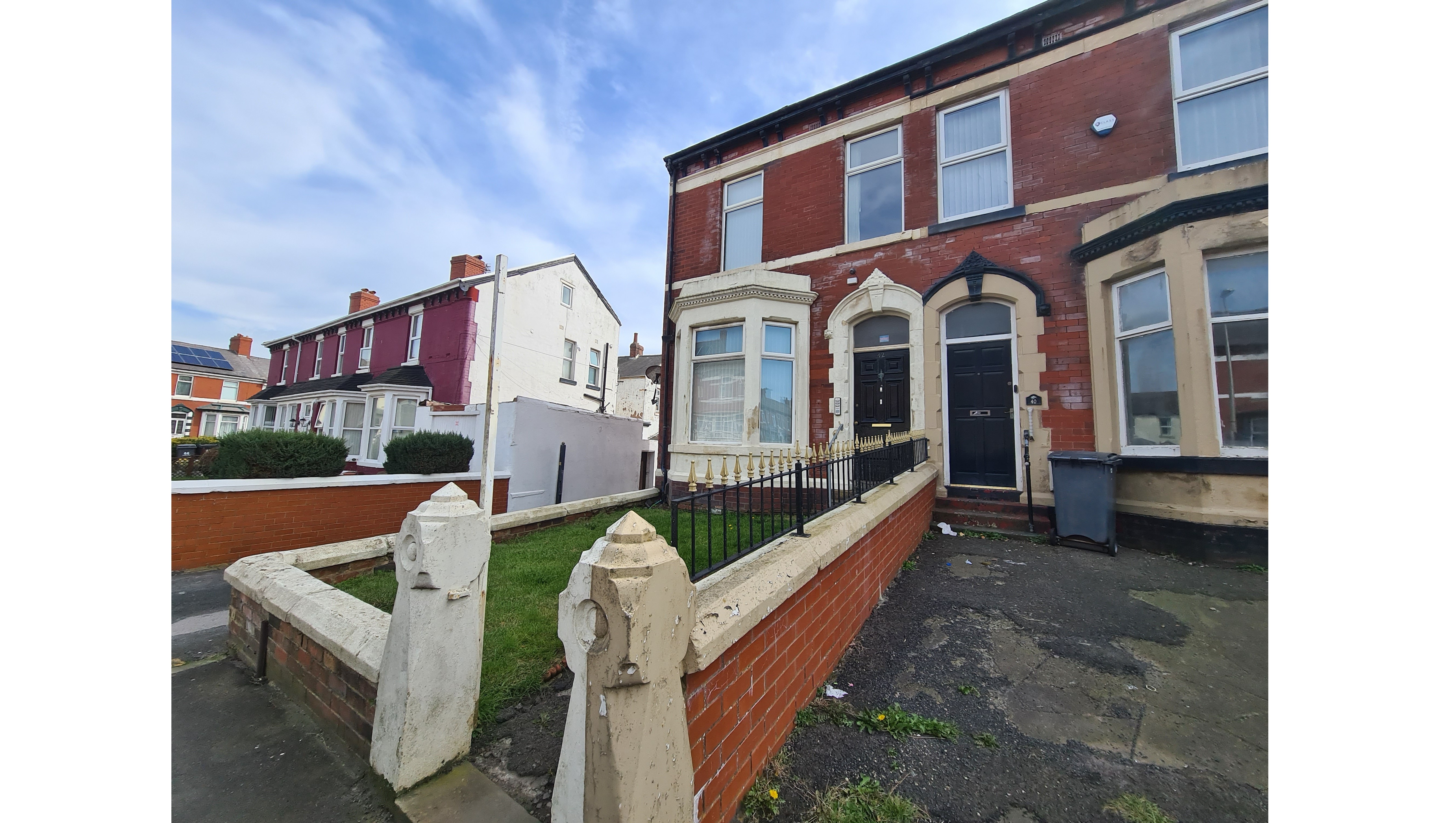 INVESTMENT - Freehold End of Terrace Building arranged to provide Three self contained Flats