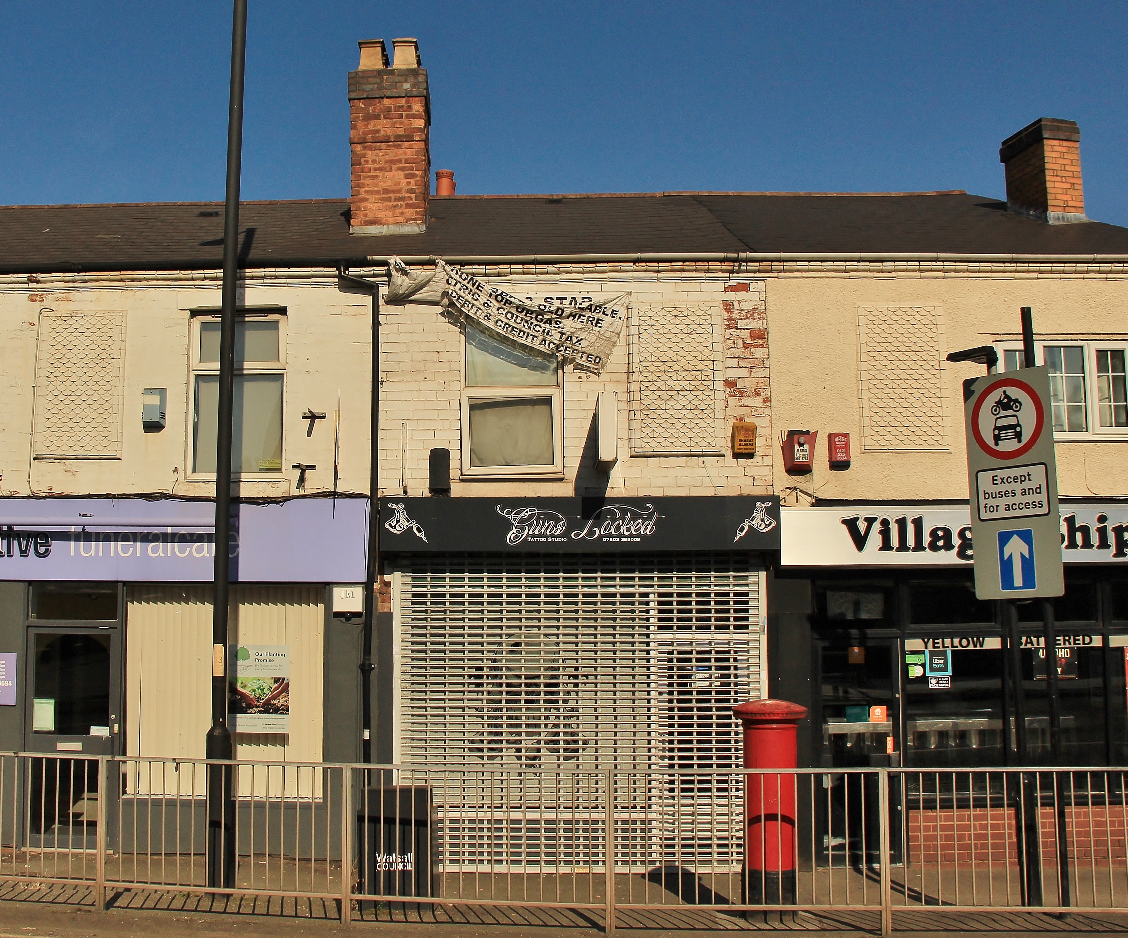 INVESTMENT - Freehold Building comprising Shop Unit and Self Contained Flat above