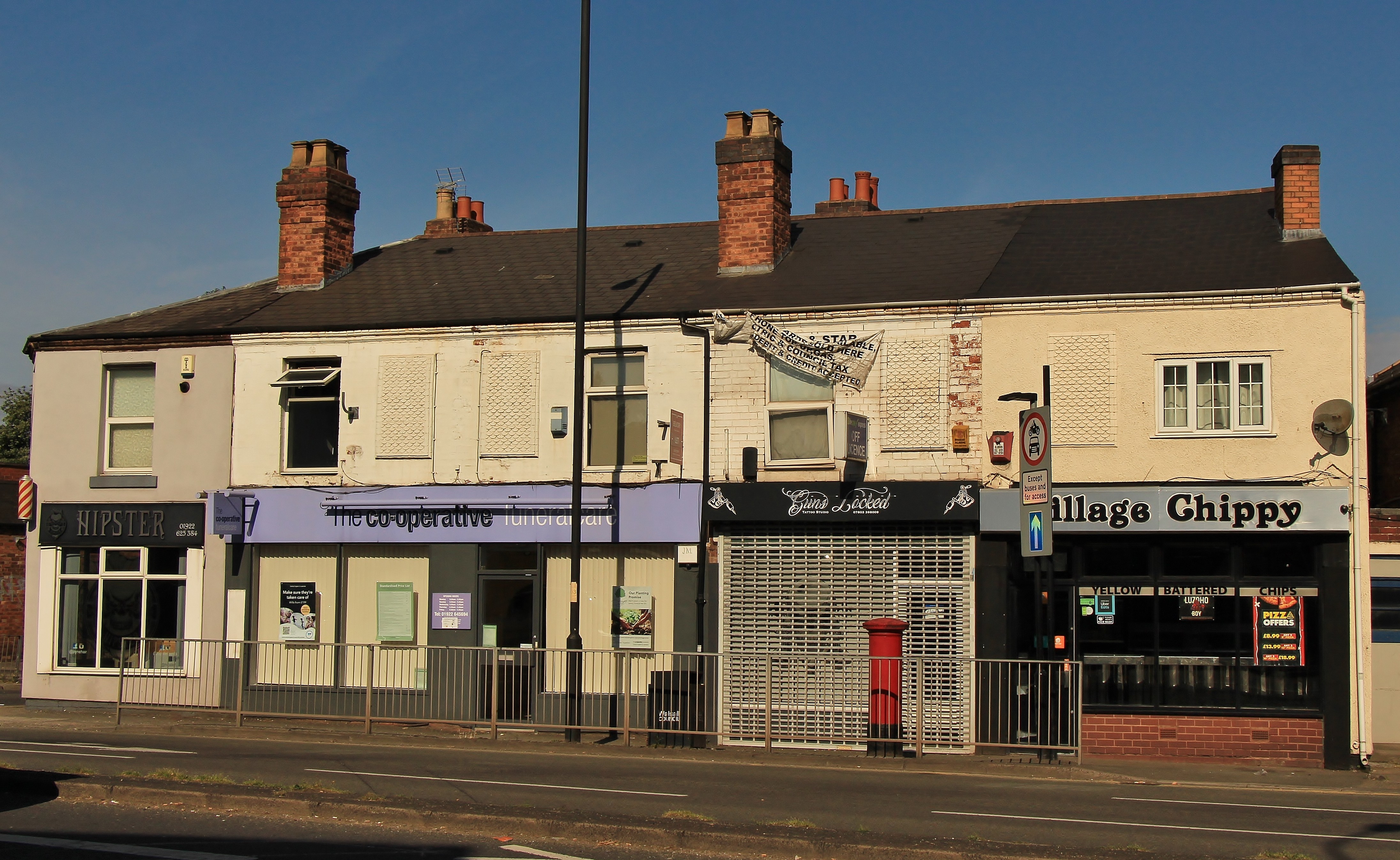 INVESTMENT - Freehold Building comprising Shop Unit and Self Contained Flat above