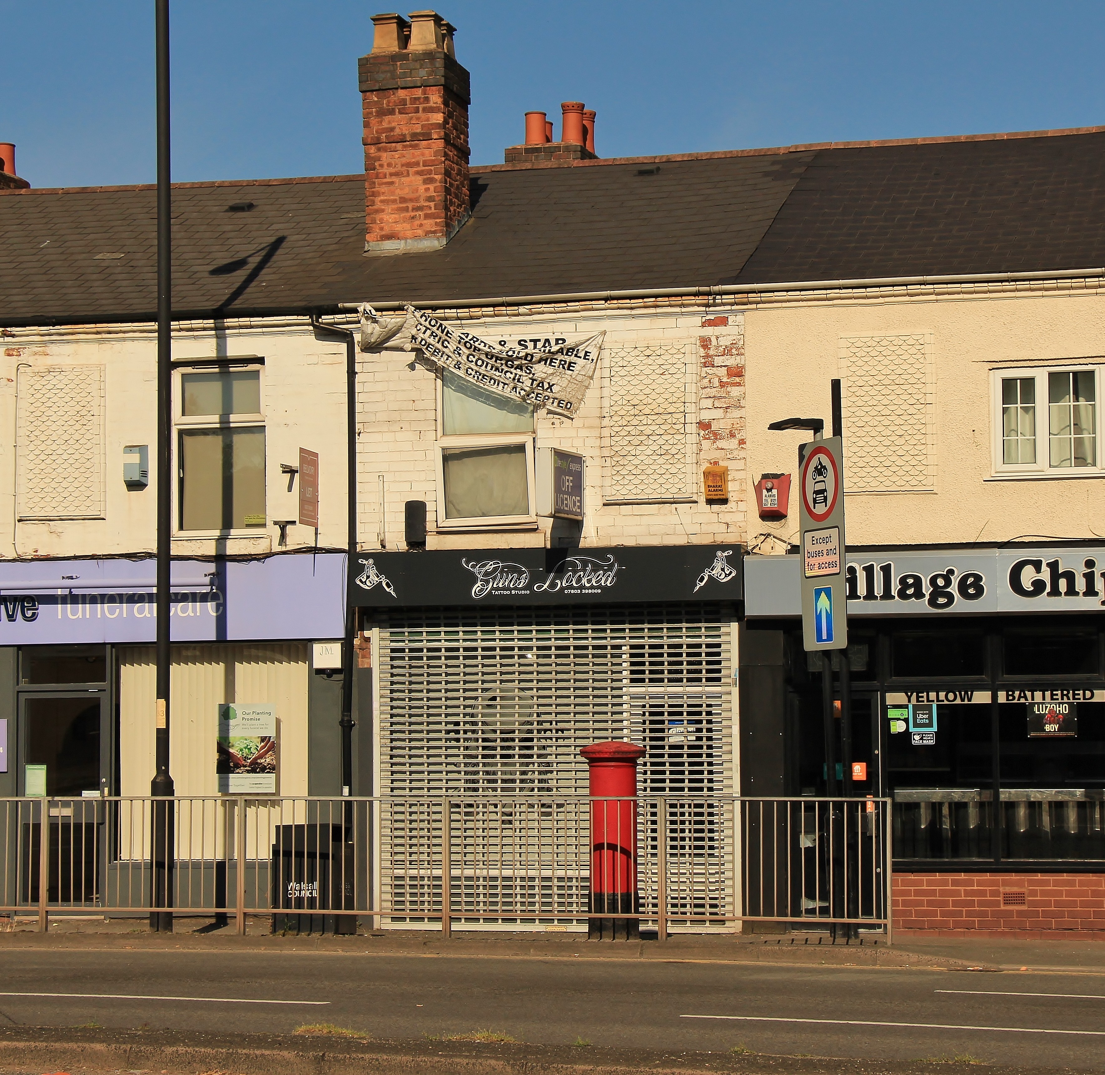 INVESTMENT - Freehold Building comprising Shop Unit and Self Contained Flat above