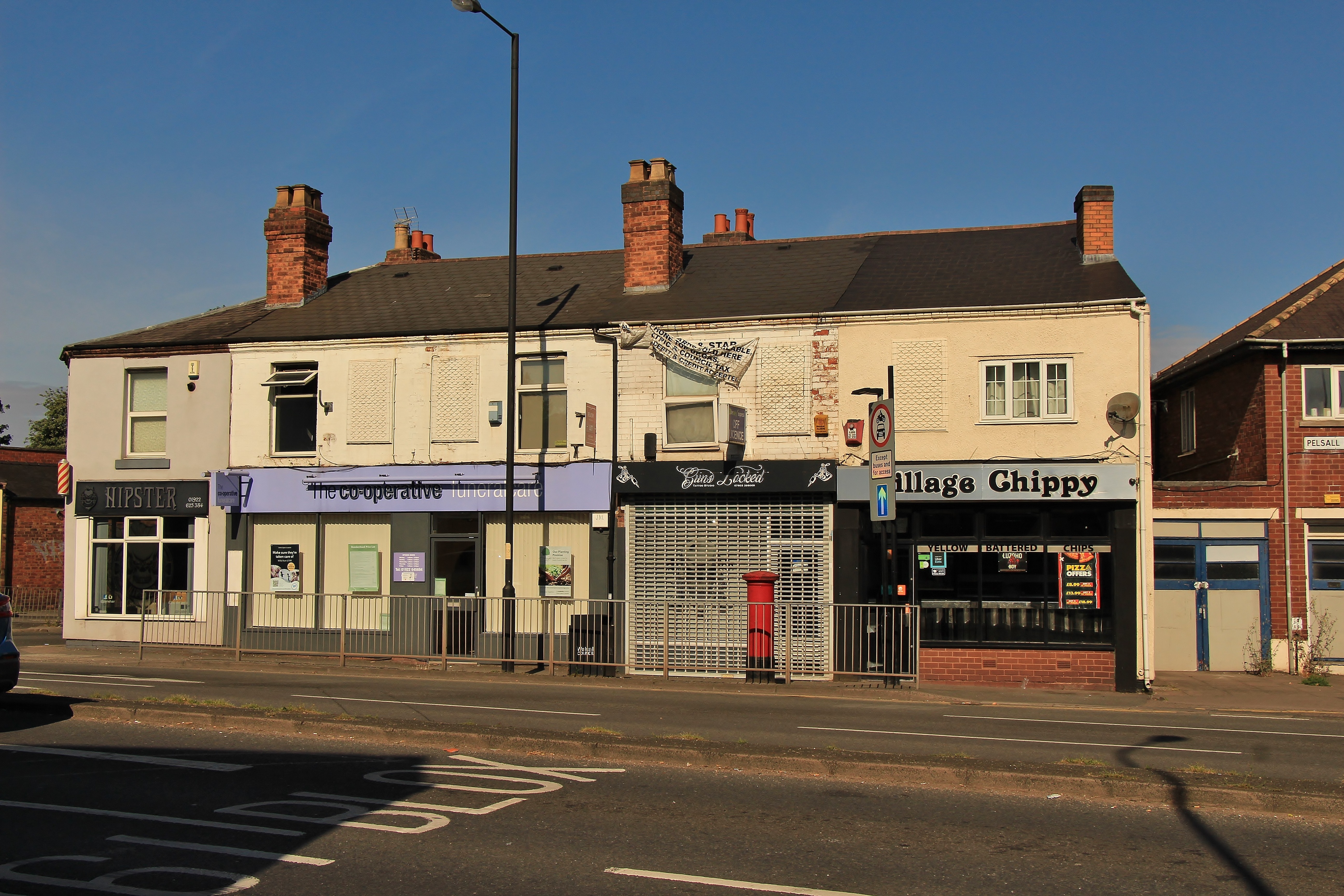 INVESTMENT - Freehold Building comprising Shop Unit and Self Contained Flat above