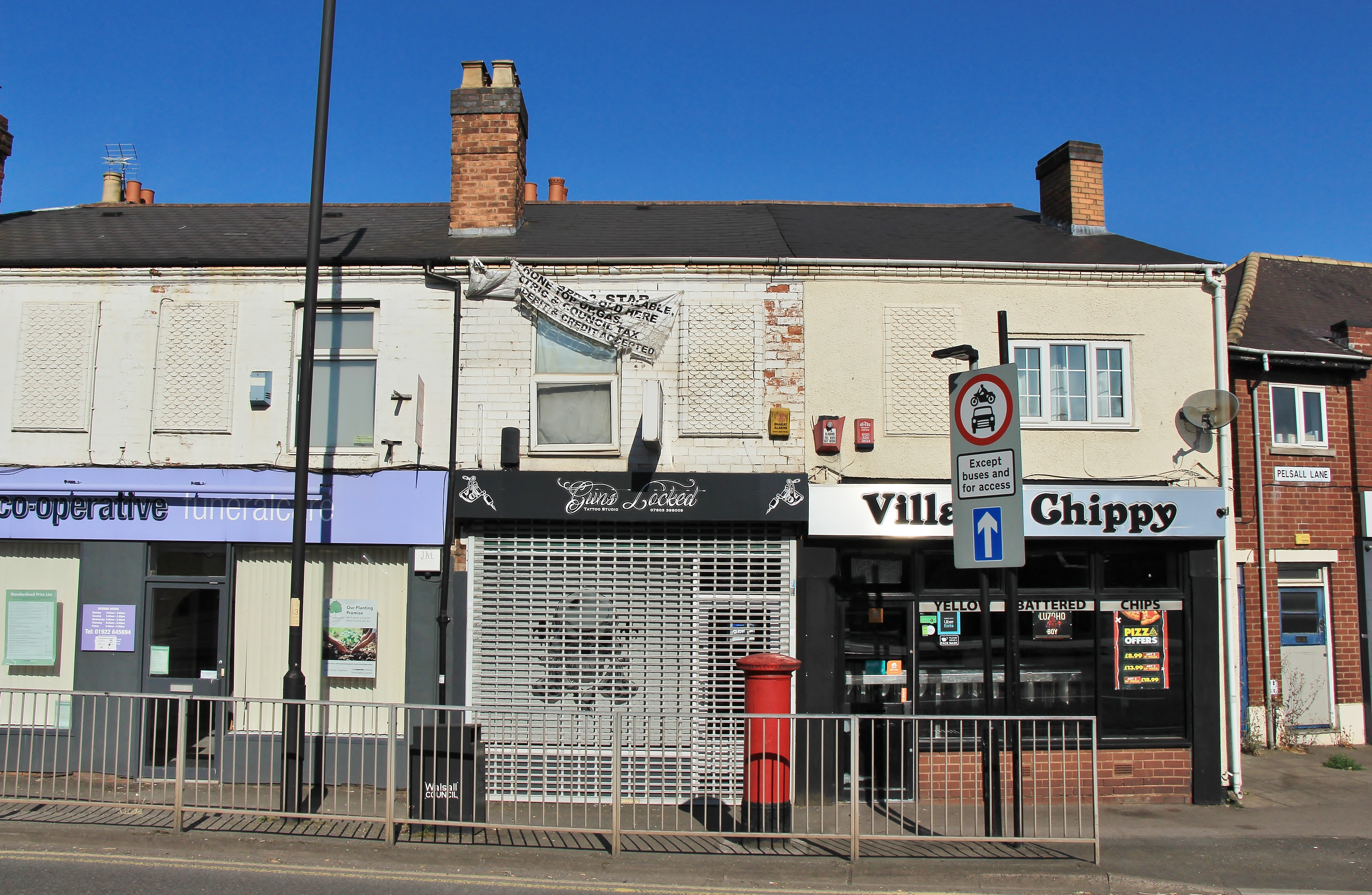 INVESTMENT - Freehold Building comprising Shop Unit and Self Contained Flat above