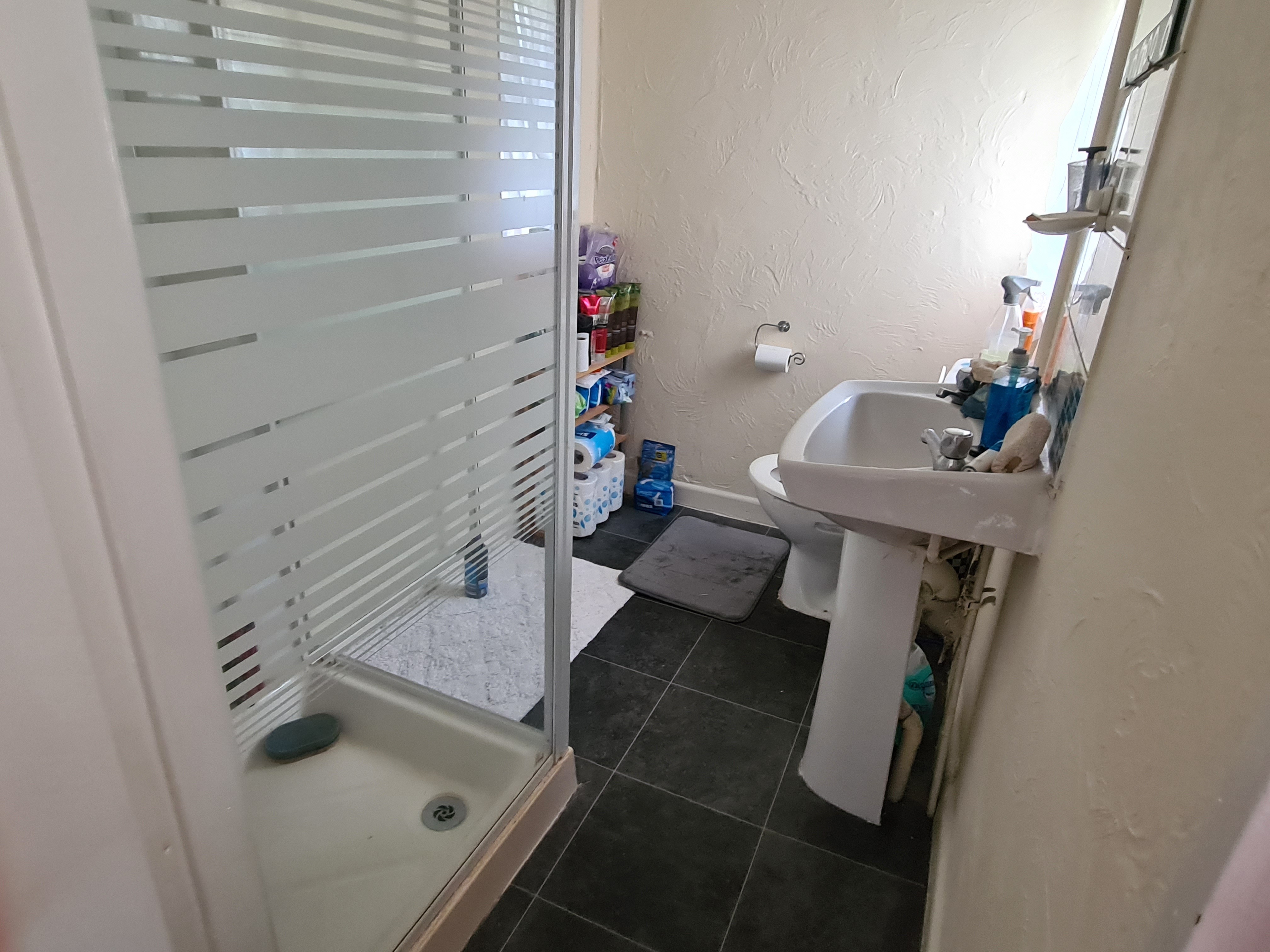INVESTMENT/VACANT - Freehold Mid Terrace Building providing Four self-contained Flats