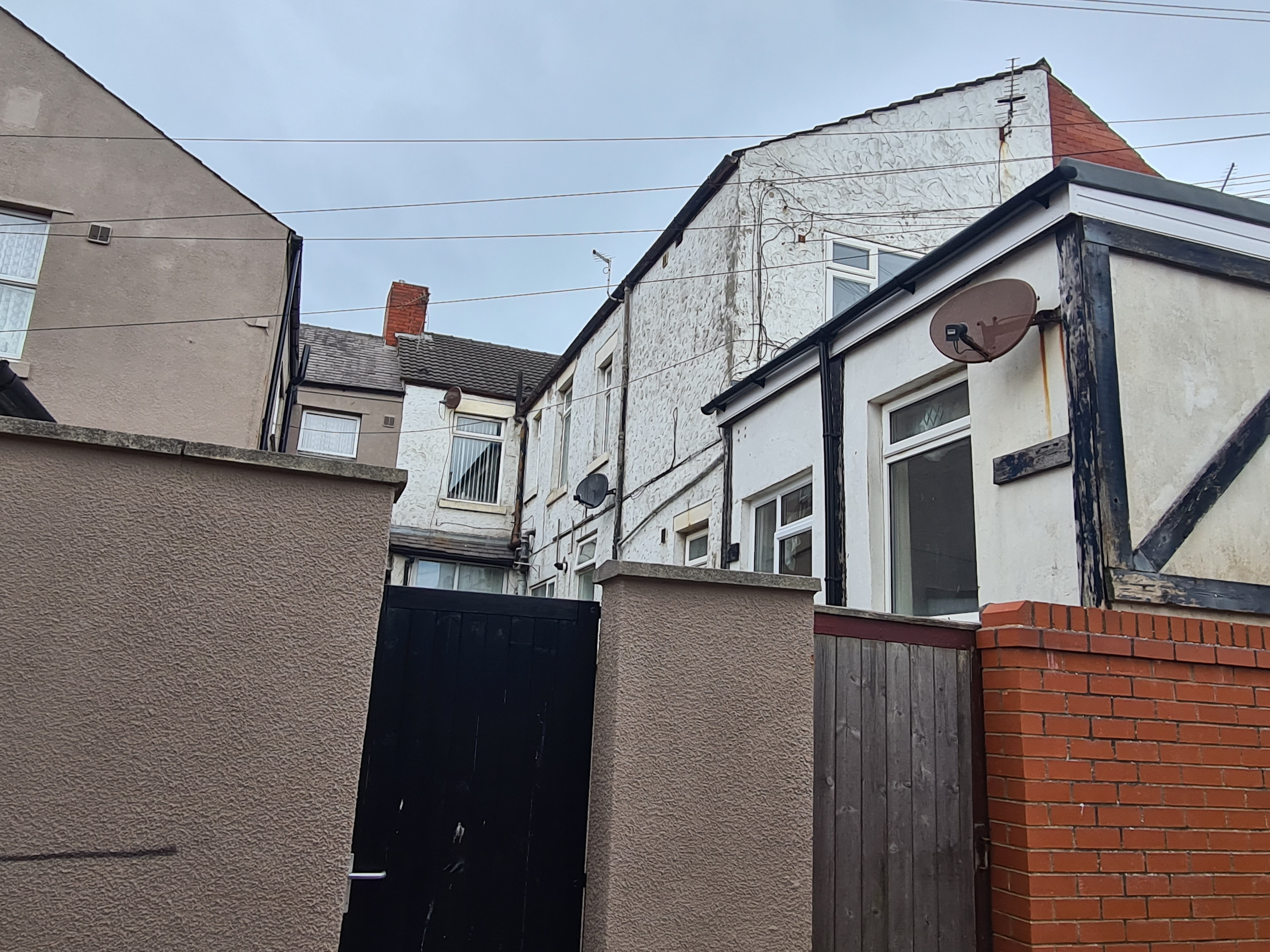 INVESTMENT/VACANT - Freehold Mid Terrace Building providing Four self-contained Flats